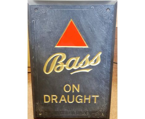 A Brewery Advertising Slate Bar Tile 'Bass on Draught' gilt lettering on black ground and red trade mark triangle, approx 31 