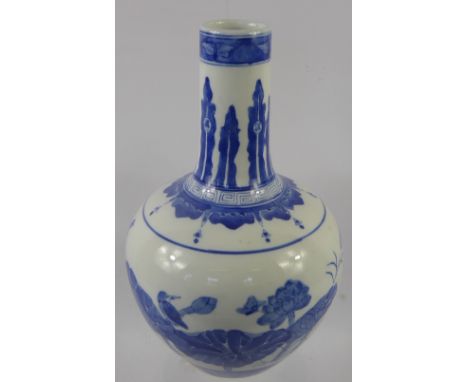 A Blue and White Chinese Vase, decorated with water lily, approx 34 cms