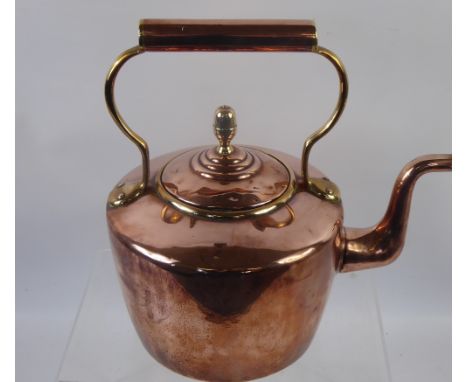 A Copper and Brass Fireside Kettle, together with miscellaneous brass, including two candlesticks, candle holder, three horse
