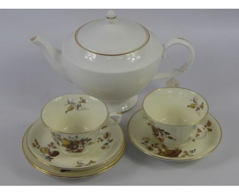 A Part Royal Worcester Tea Set, comprising eleven tea cups, eleven saucers, sugar bowl, twelve cake plates and a Wedgwood tea