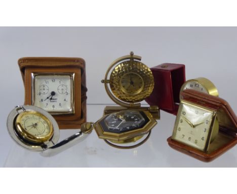 Miscellaneous Travelling Clocks, including Swiza 7 Jewel, Europe 2 Jewel, The Dalvey Voyager Clock, Swiza 8 Day Clock in red 