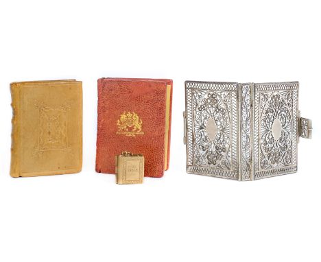 Silver Filigree Binding. An empty silver miniature binding, early 19th century, ornate filigree hinged case for an almanack, 