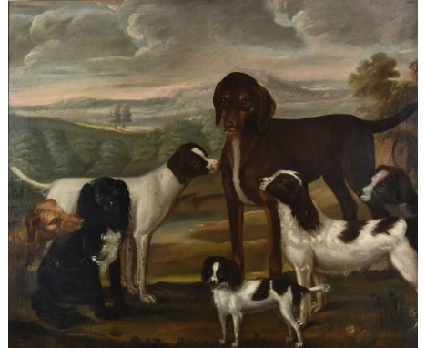 Naive School. Portrait of Seven Dogs, circa 1780s, oil on canvas, depicting seven dogs in a landscape with rolling hills, tre