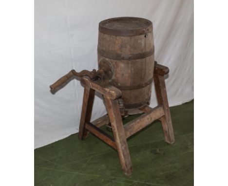 A vintage butter churn