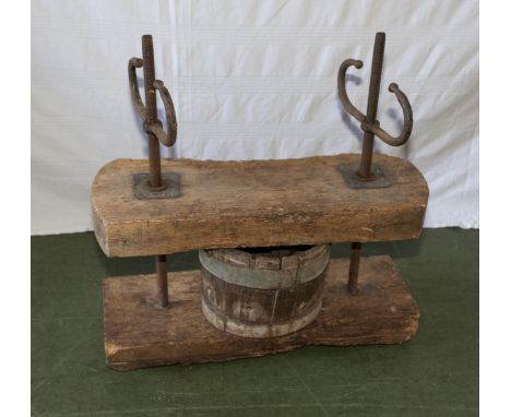 A vintage fruit/cheese press