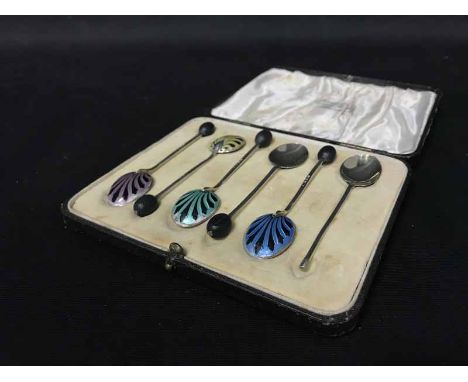 SET OF SIX SILVER AND ENAMEL SILVER COFFEE SPOONSin fitted case