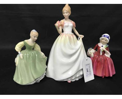 ROYAL DOULTON FIGURE OF GIFT OF LOVEHN3427; along with two other smaller Royal Doulton ladies, a Lladro figure, etc (6)