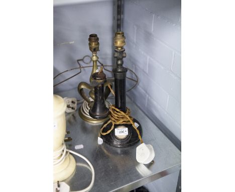 AN ARTS AND CRAFTS BRASS ELECTRIC TABLE LAMP, ALSO A CANDLESTICK TELEPHONE ADAPTED TO A TABLE LAMP 
