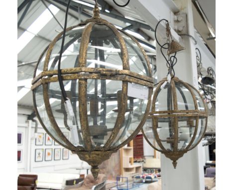 GLOBE CEILING LIGHTS, a pair, in metal and glass in a vintage gold finish. (2)