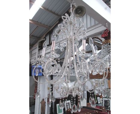 CHANDELIER, Contemporary design glass having eight scrolling beaded arms with tear droplets, 100cm H plus chain.