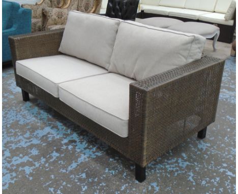 GARDEN SOFA, two seater, in synthetic rattan weave, 84cm x 86cm H x 177cm. (with faults)