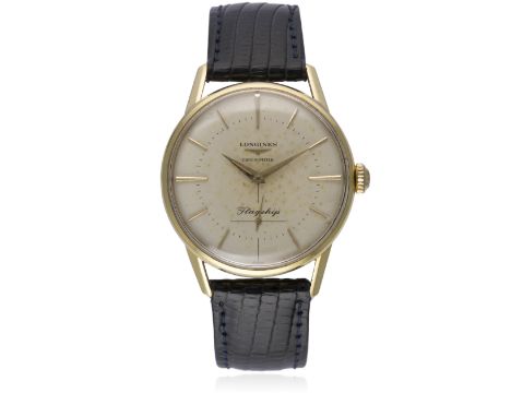 A RARE GENTLEMAN'S 18K SOLID GOLD LONGINES FLAGSHIP CHRONOMETER WRIST WATCH CIRCA 1957
D: Silver dial with gilt batons &amp; 