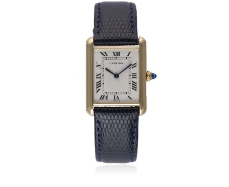 A GENTLEMAN'S 18K SOLID GOLD CARTIER TANK WRIST WATCH CIRCA 1980s 
D: White dial with black Roman numerals &amp; inner minute