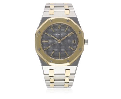 A GENTLEMAN'S STEEL &amp; GOLD AUDEMARS PIGUET ROYAL OAK BRACELET WATCH CIRCA 1990s 
D: Grey "Clous de Paris"&nbsp;dial&nbsp;