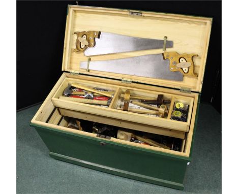 Large wooden trunk toolbox containing saws, hammers and wooden planes (qty)