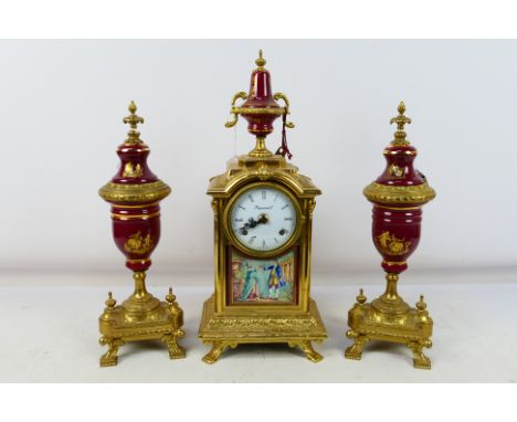 An Italian clock garniture, gilt metal and ceramic, white enamel dial with Roman numerals signed Imperial above a scene depic
