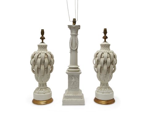 A pair of Spanish white glazed Casa Pupo table lamps, second half 20th century, each of stylised leaf and berry design, the g