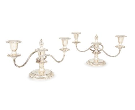 A pair of silver three branch candelabra, Birmingham, 1965, Barker Ellis Silver Co., designed with reeded branches to removab