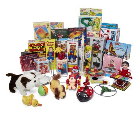 A quantity of plastic toys, mostly late 20th century, to include: Manhattan Bank, clockwork, plastic, paper, boxed, 50cm high