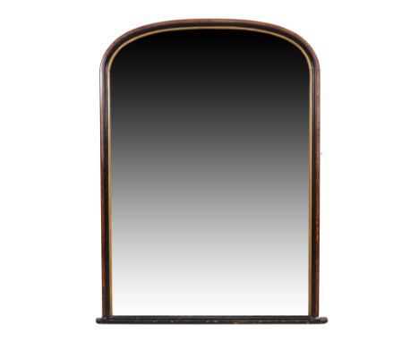 A large Victorian burr maple and part ebonised over mantel mirror, c.1860, the arched top with mirror plate have parcel gilt 