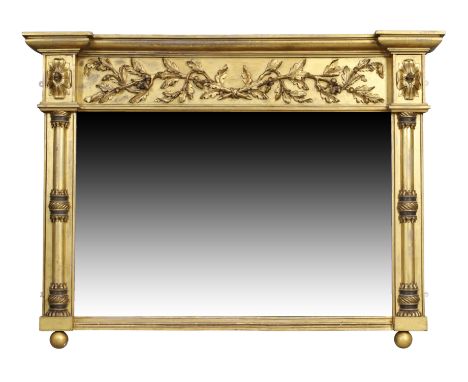 A Regency giltwood over mantel mirror, c.1820, the moulded cornice above frieze, carved with acorn leaves, and mirror plate, 