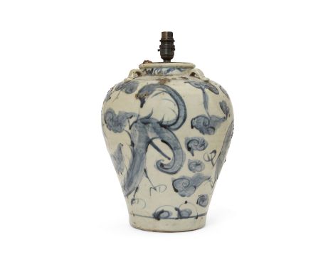 A Chinese provincial blue and white vase, 19th century, converted to a lamp base, the high shoulder with moulded four handles