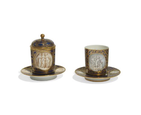 A Höchst porcelain blue ground coffee cup and cover with trembleuse saucer, and a Höchst blue ground coffee cup and trembleus
