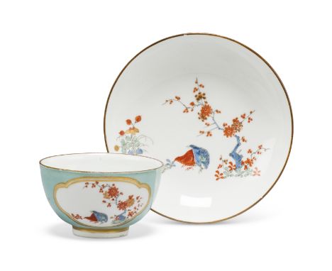 A Meissen porcelain celedon ground tea bowl and saucer, c.1735, blue crossed swords marks, wheel-engraved N=492 / W Japanese 