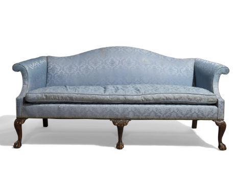 A George III style three seat camel back sofa, mid 20th century, with scroll arms and blue floral damask upholstery, raised o