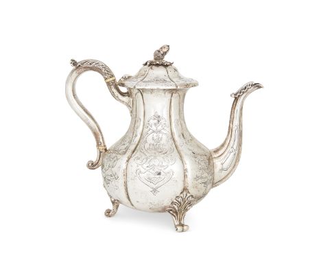 A Victorian silver coffee pot, London, 1840, Robert Hennell III, of baluster form and raised on three foliate-shouldered scro