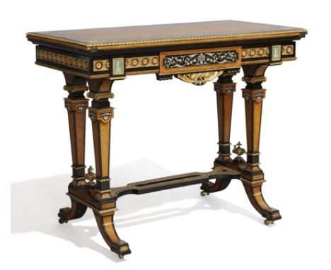 A Victorian amboyna and ebonised card table, c.1860, ormolu mounted and ivory inlaid, the swivel fold over top enclosing gree