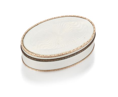 A Russian silver gilt and white guilloche enamel box, St Petersburg, 3rd Artel, c.1915, 88 zolotniki, of oval form, the hinge