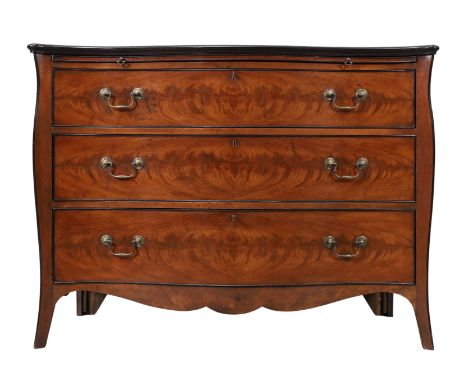 A George III style mahogany serpentine commode, late 20th century, boxwood inlaid and part ebonised, with brushing slide abov