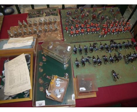 Large selection of various scale cast metal military miniatures, mostly with painted finish, set out in various scenery 