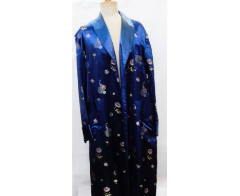 A Chinese style dark blue satin full-length dressing gown with tie belt 