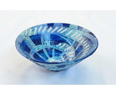 Caroline Genders 
Studio pottery flared rim bowl, painted blue line decoration, of blue and white spiral design, with raised 