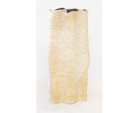 Set of three studio ceramic tinted bisque vases of misshapen cylindrical form, wavy fold design, tinted bisque exterior with 