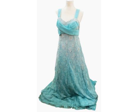 A blue lace and chiffon 1950's evening dress with embroidered gilt detail together with a 1980's nylon cream and appliqued wh