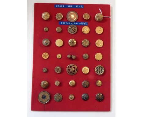 Various buttons set on cards including brass, gilt, copper, ceramic, some showing Humpty Dumpty, millefiori-style buttons, wa