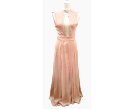 A 1930's crepe de chine salmon pink full-length evening dress with low back and a tie 
