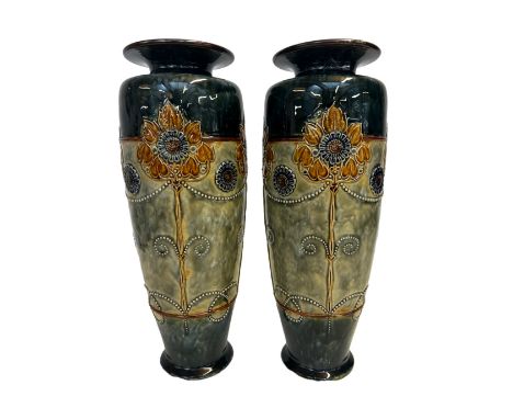 Pair of Royal Doulton art nouveau vases. Height 36 cm