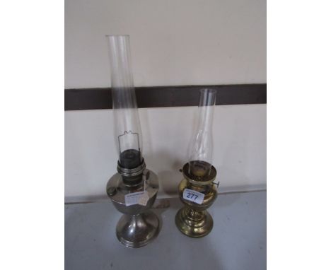  Sale Item:    2 PARAFFIN LAMPS   Vat Status:   No Vat   Buyers Premium:  This lot is subject to a Buyers Premium of 15% + Va