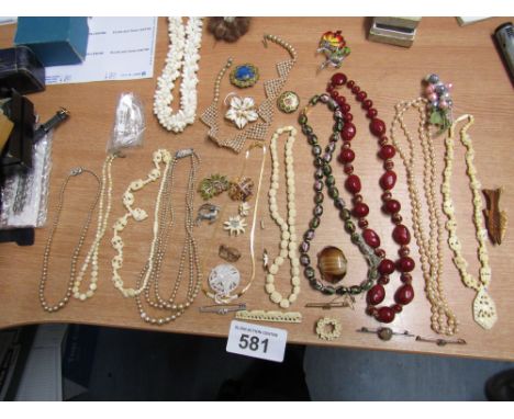  Sale Item:    NECKLACES & BROOCHES   Vat Status:   No Vat   Buyers Premium:  This lot is subject to a Buyers Premium of 15% 