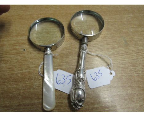  Sale Item:    2 MAGNIFYING GLASSES- 1 SILVER HANDLE 1 SILVER RIM / MOP HANDLE  Vat Status:   No Vat   Buyers Premium:  This 