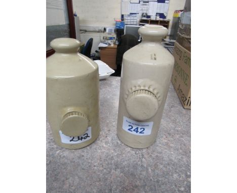  Sale Item:    2 STONE HOT WATER BOTTLES (AF)   Vat Status:   No Vat   Buyers Premium:  This lot is subject to a Buyers Premi