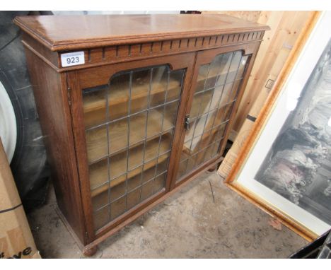 Sale Item:    LEADED GLASS BOOKCASE   Vat Status:   No Vat   Buyers Premium:  This lot is subject to a Buyers Premium of 15%