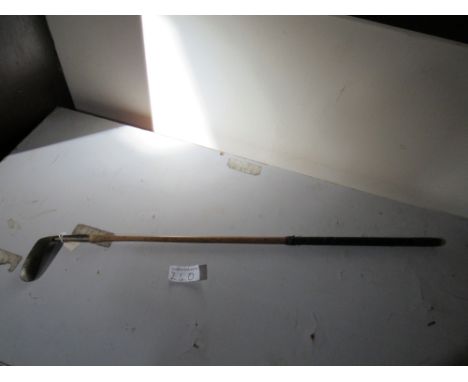  Sale Item:    THISTLE BRAND BRASS PUTTER WITH WOODEN SHAFT (AF)  Vat Status:   No Vat   Buyers Premium:  This lot is subject