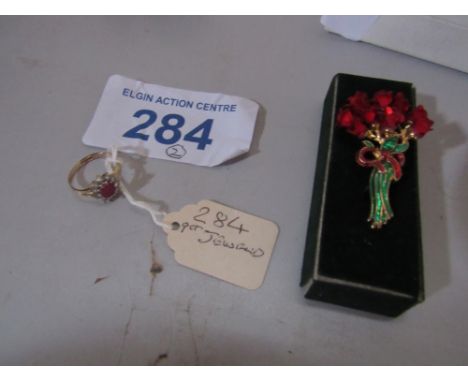  Sale Item:    9 CT GOLD LADIES ENGAGEMENT RING & BOXED RED ROSES BROOCH  Vat Status:   No Vat   Buyers Premium:  This lot is