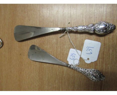  Sale Item:    2 SILVER HANDLE SHOE HORNS BIRMINGHAM 1904 CHESTER 1914  Vat Status:   No Vat   Buyers Premium:  This lot is s