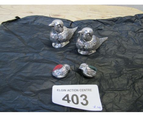  Sale Item:    PAIR SILVER CHICKS & 2 WHITE METAL BIRD CASTORS  Vat Status:   No Vat   Buyers Premium:  This lot is subject t